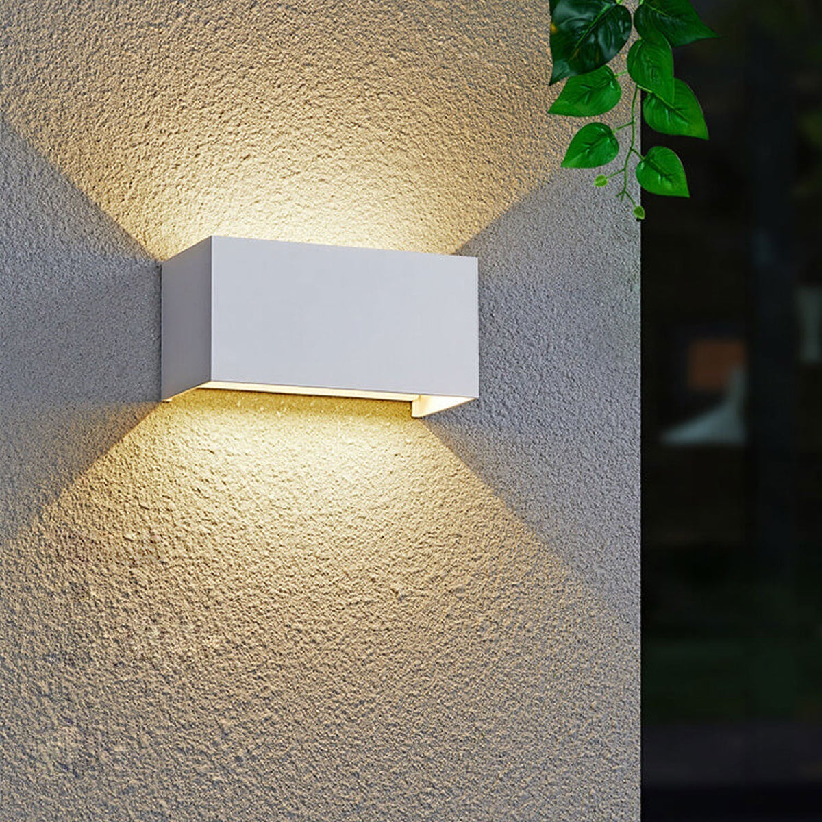 Modern waterproof rectangular LED wall light for outdoor use with upward and downward lighting