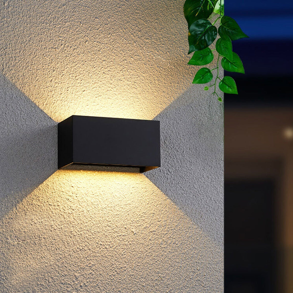 Modern waterproof rectangular LED wall light for outdoor use with upward and downward lighting