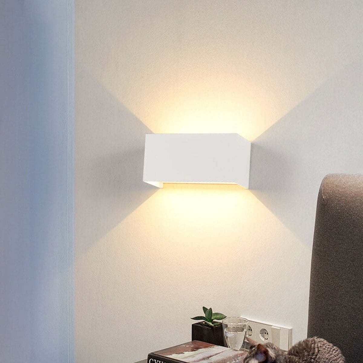 Modern waterproof rectangular LED wall light for outdoor use with upward and downward lighting