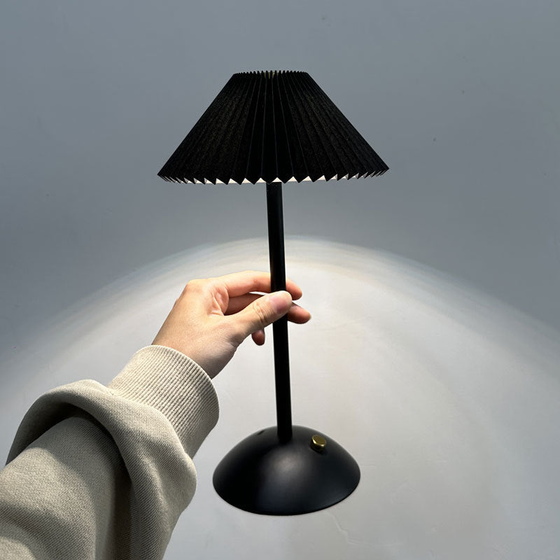Contemporary Scandinavian rechargeable iron fabric conical folded LED table lamp for bedside