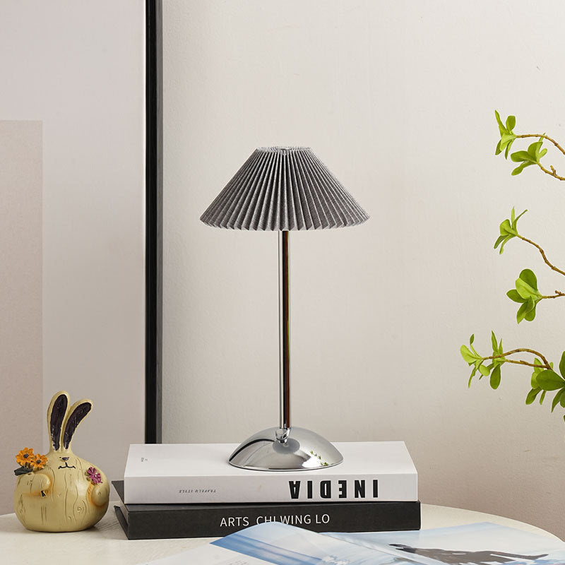 Contemporary Scandinavian rechargeable iron fabric conical folded LED table lamp for bedside