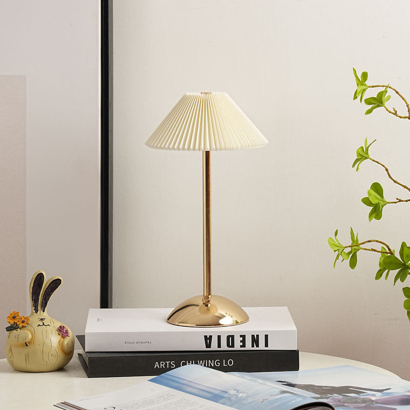 Contemporary Scandinavian rechargeable iron fabric conical folded LED table lamp for bedside